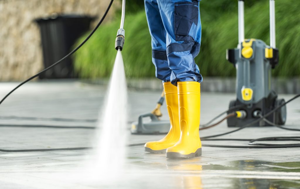 a men washing residential bricks made driveway and 2023 08 09 02 01 17 utc